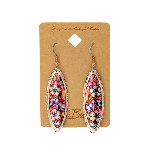 The Floral Oblong Earrings by Lynn Bean look like tiny windows to a magical place, full of foliage, flowers, and a stunning Montana sunset.