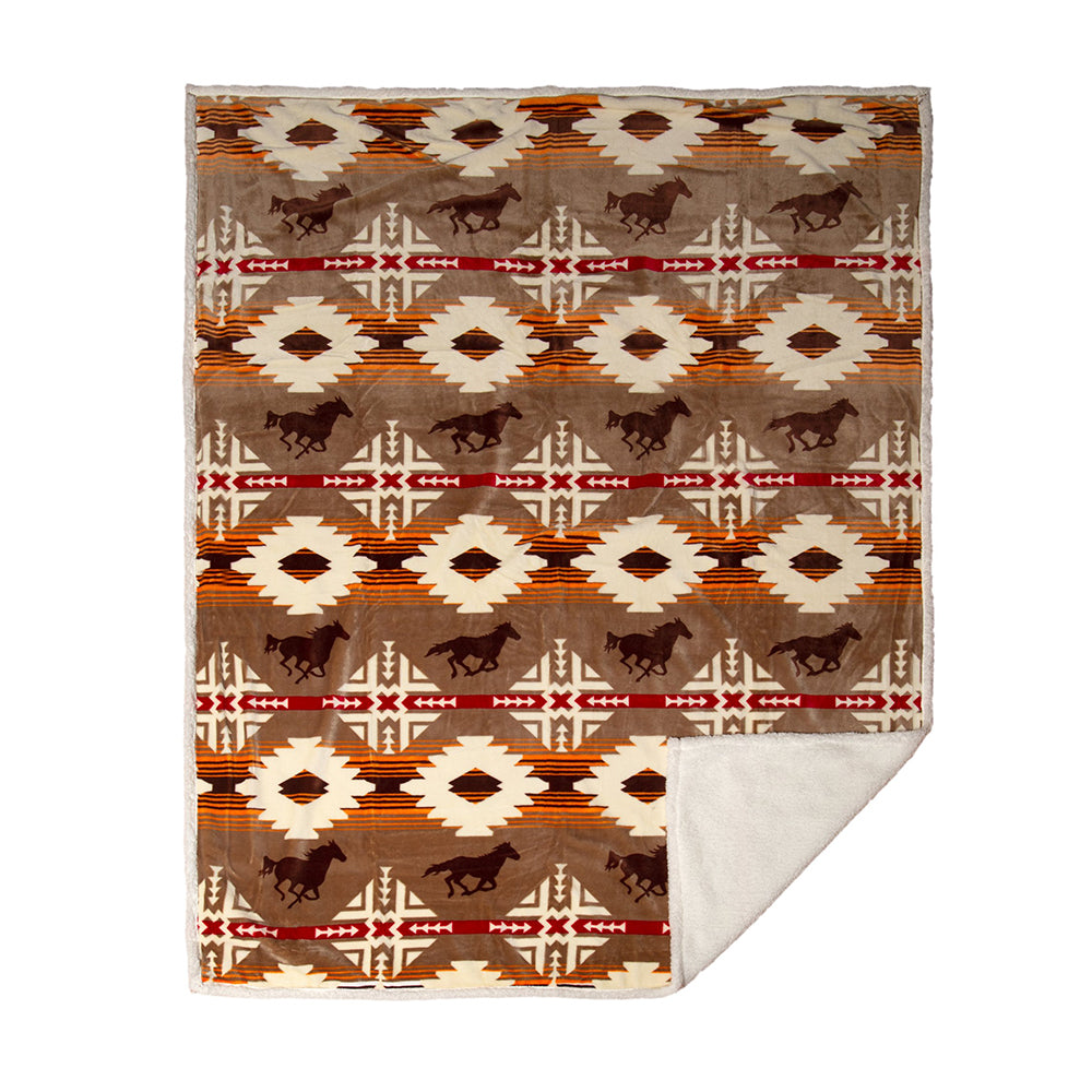 Free rein sherpa throw blanket by carstens features a light brown background with western design in light cream, with orange and red detail and brown horses