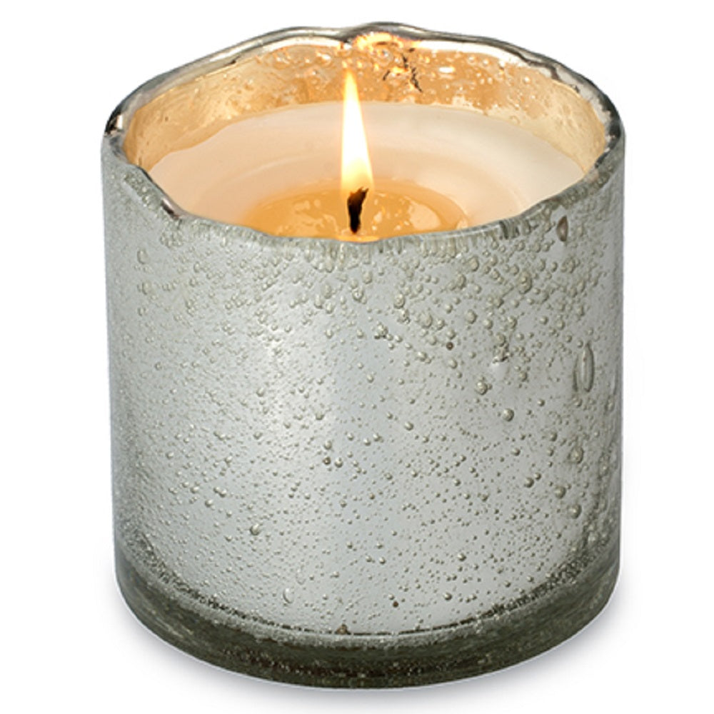 The Ginger Patchouli Silver Artisan Tumbler Candle by Himalayan Trading Post brings a gentle and intriguing scent to any room.