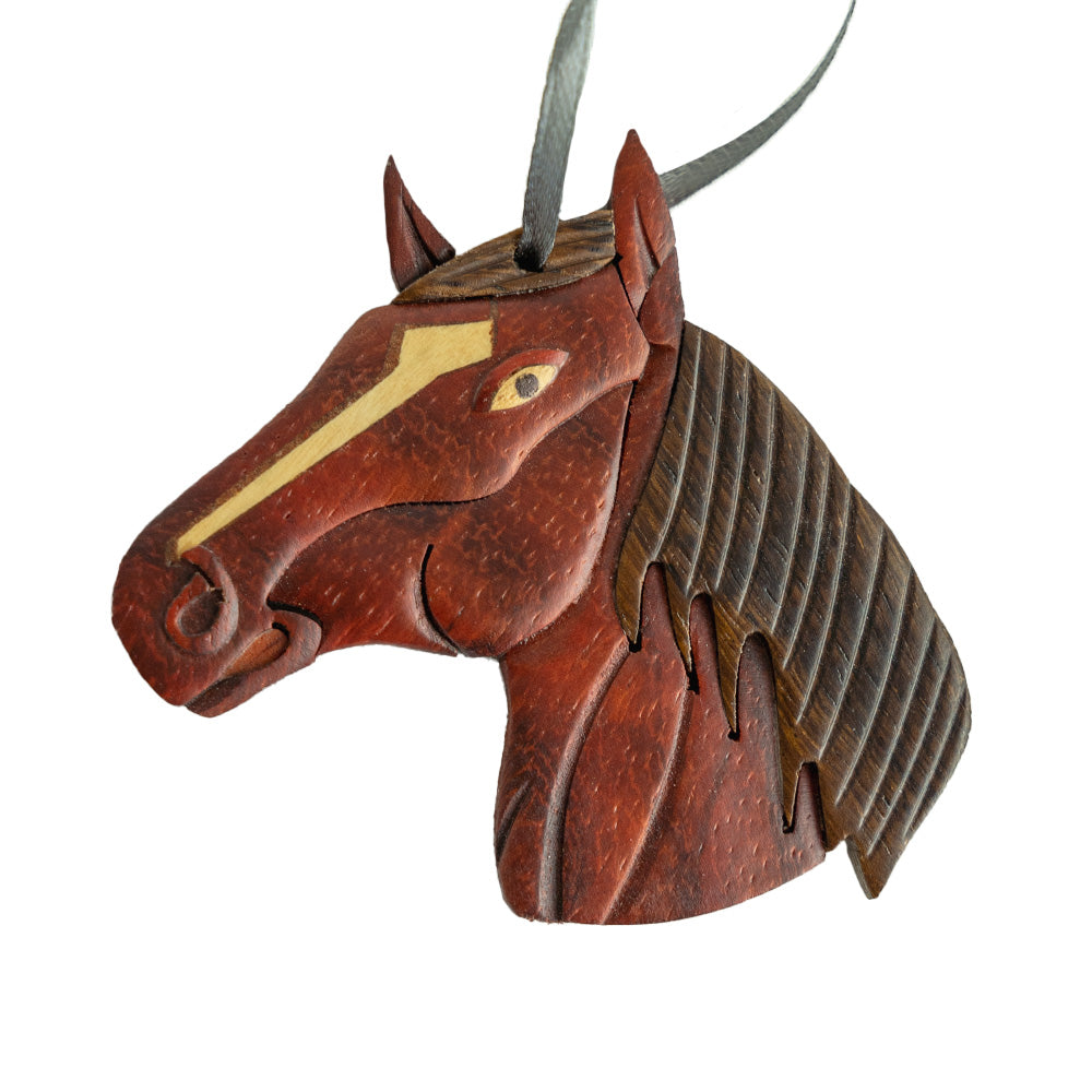 If you have a horse person in your life, you know how fulfilling caring for their horse can be and that's why we love our Wood Horse Ornament by The Handcrafted.