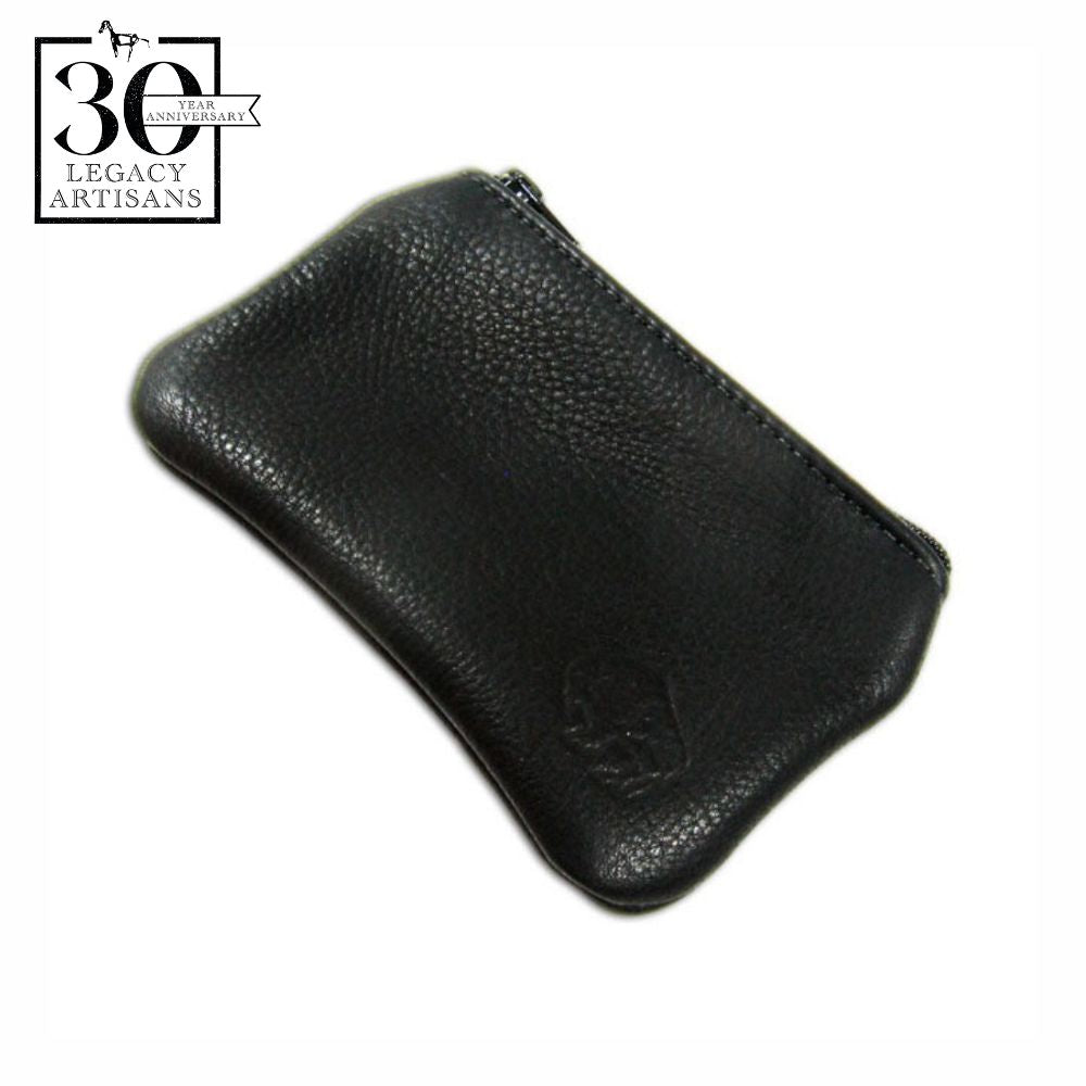 A black leather coin purse with a zipper closure, displayed against a white background with a '30th Anniversary' logo and 'Legacy Artisans' seal.
