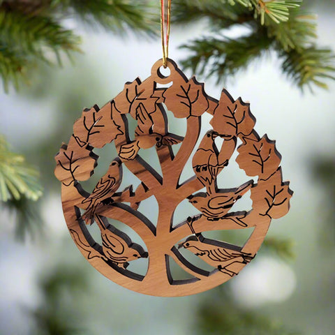 Made with hand picked Olive wood from trees that are never cut down, the Laser Cut Tree of Life with Birds Ornament by Earthwood is a beautiful homage to God's flying creations, perched upon the Tree of Life.