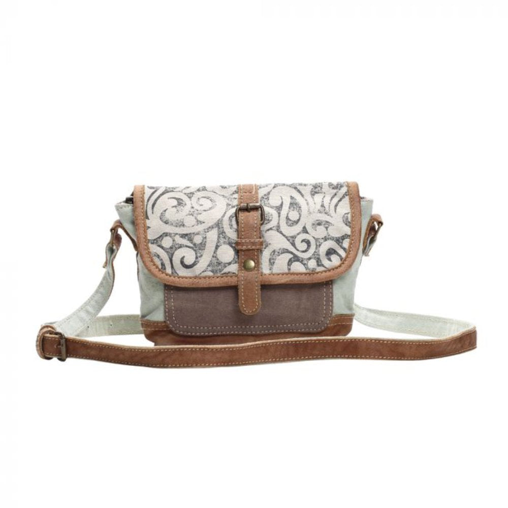 The Leaf Print Small Cross Body Bag by Myra Bag is a beautiful example of a simple every day handbag that shows the people around you a bit of what you love.