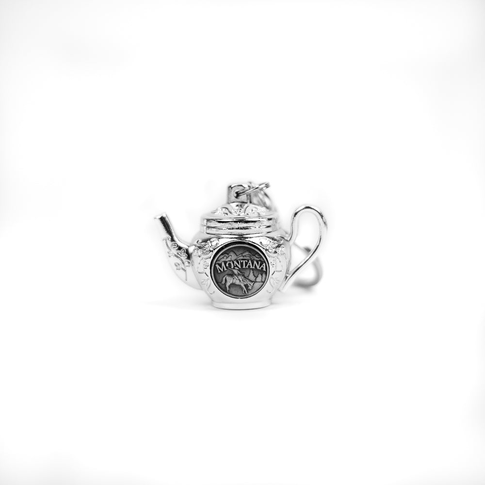 Antique teapots are the cutest! Now you can take one wherever you go with the Montana Icons Mini Teapot Keychain by Dutch American Import Company. Well crafted souvenir key chains can be hard to come by, but now there is no need to worry.