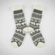 Gray socks with white pattern on a white background