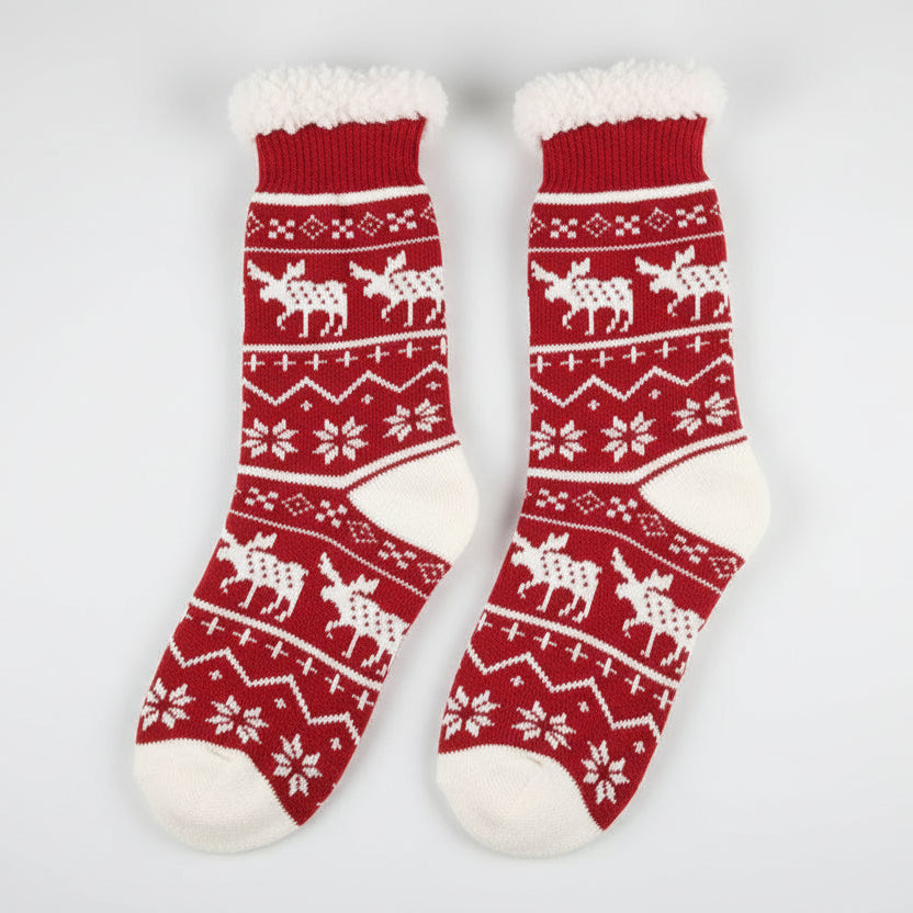 Red socks with white moose pattern on a white background