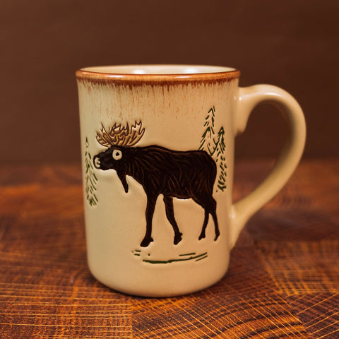 The Rustic Retreat Moose Mug by Park Designs features a rustic sgraffito carved moose that is sure to catch the eye of any lodge lover!