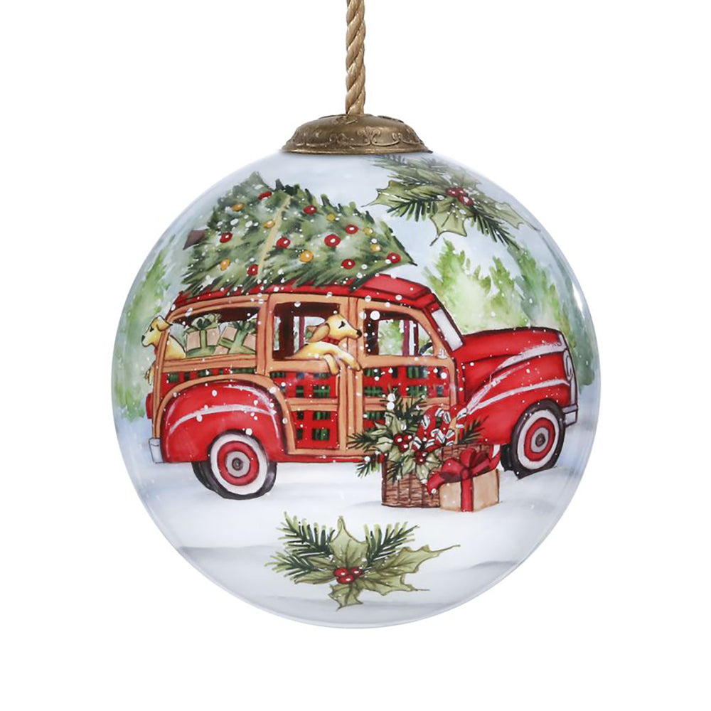 The Susan Winget I'll Be Home for Christmas Ornament by Inner Beauty depicts the perfect Christmas journey which includes presents, a Christmas tree, and dogs! 