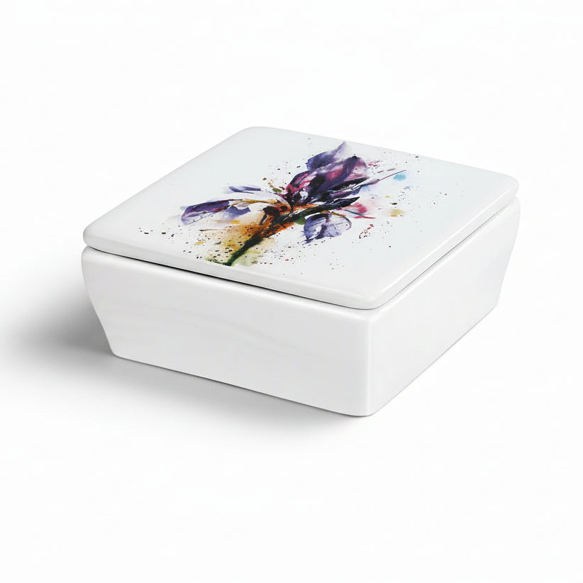 Ceramic vanity box with a lid featuring a watercolor-style painting of an iris flower in shades of purple and blue.