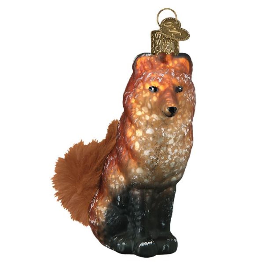 The Vintage Fox Ornament by Old World Christmas is made from blown glass and decorated to replicate the mercury finish of traditional Victorian ornaments. 