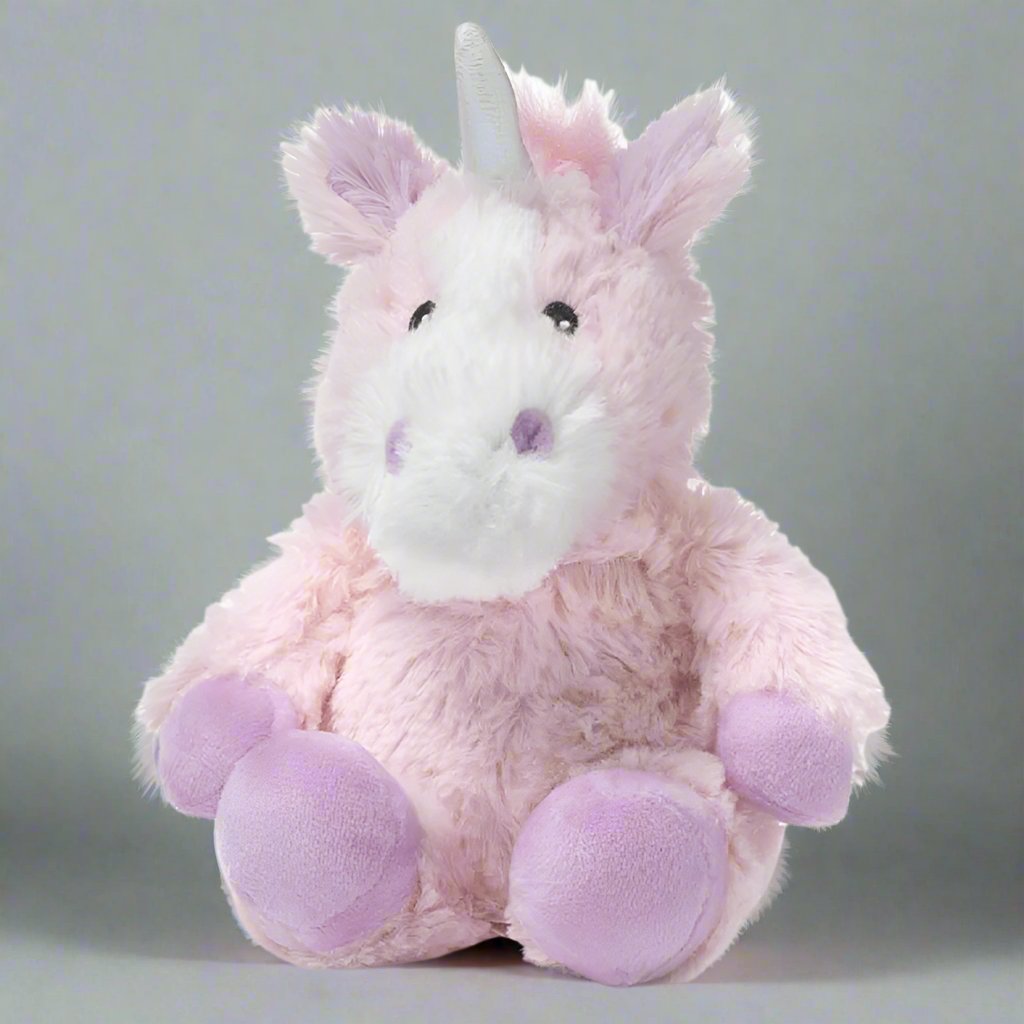 Warmies Pink Unicorn with light pink fur, light purple hooves, and a white horn.