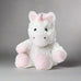 Junior Warmies White Unicoorn with white fur, light pink hooves and rainbow horn.