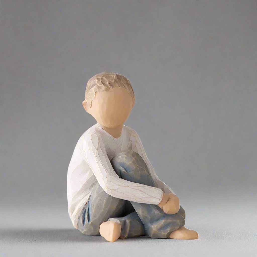 We love the Willow Tree Caring Child Figurine by Susan Lordi and his personality. Sitting in a pose that resembles someone who is patient, good at listening, and very gentle. 