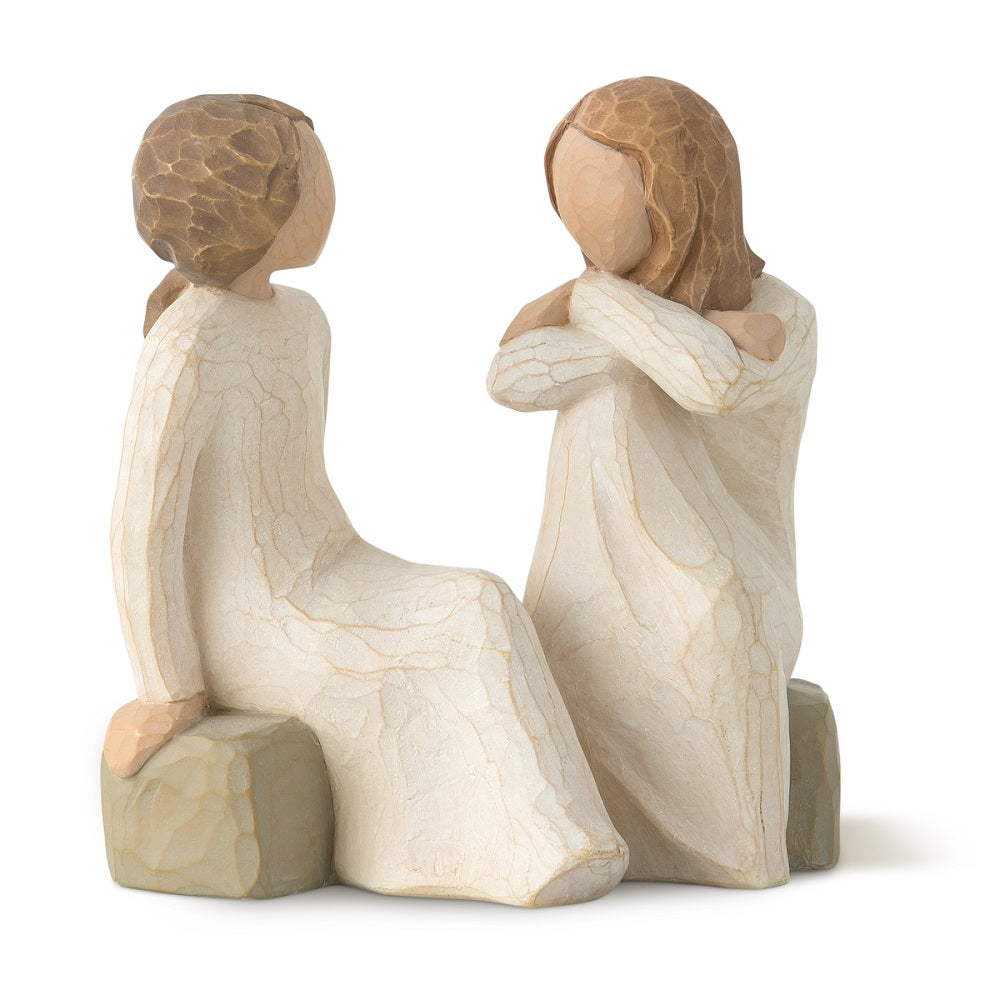 The Willow Tree Heart and Soul Figurine by Susan Lordi features two friends sitting next to each other as they have a deep and heartfelt conversation. 