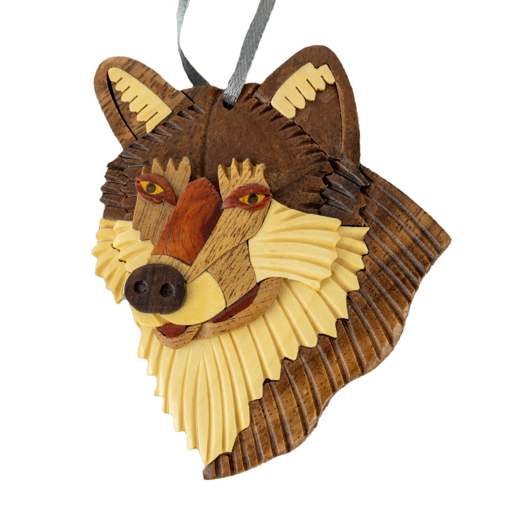 The Wood Wolf Ornament by The Handcrafted is a beautifully handcrafted, natural wood ornament that inspires love and connection. 