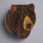 The Wood Carved Black Bear 2 Puzzle Box by The Handcrafted includes a small mechanism that acts as a lock to keep this box together and it stimulates the brain each time you open it.