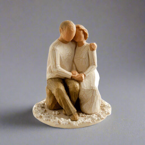 True love endures the test of time and there is no better way to celebrate that love than with the Willow Tree Anniversary Cake Topper.